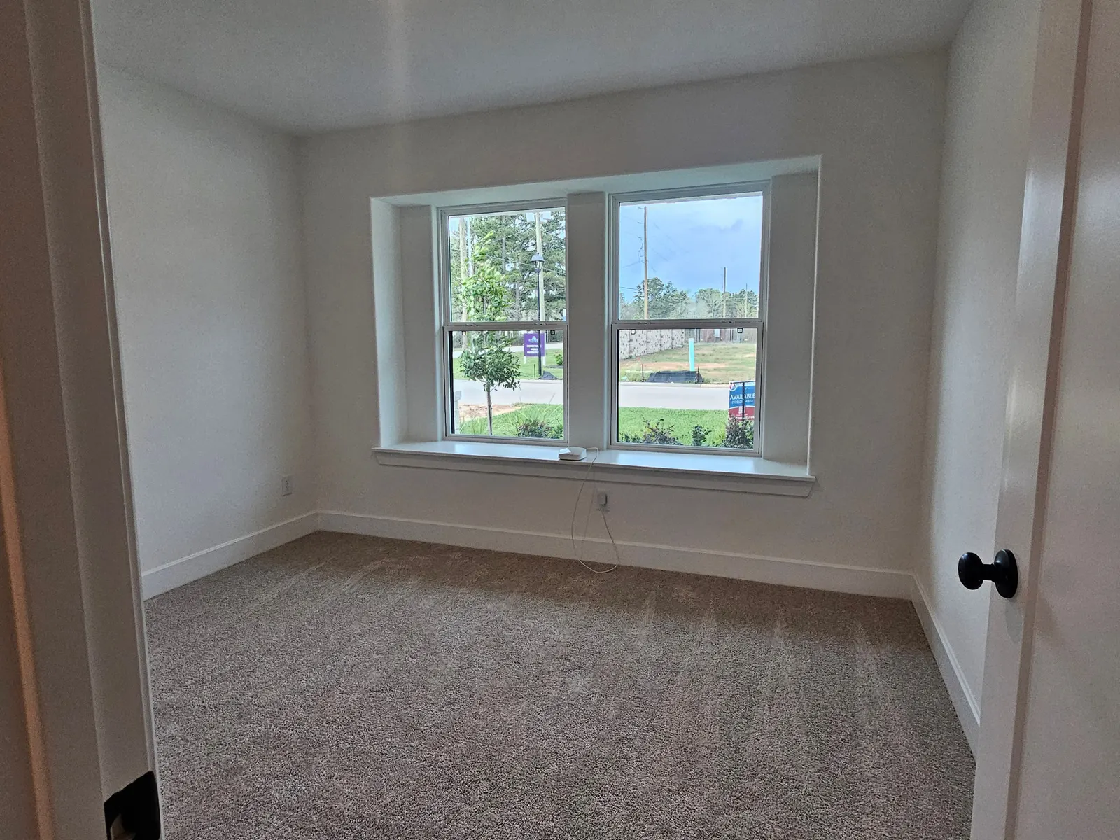 Bedroom with window seat view at 10727 Crockett Meadows, Conroe, TX