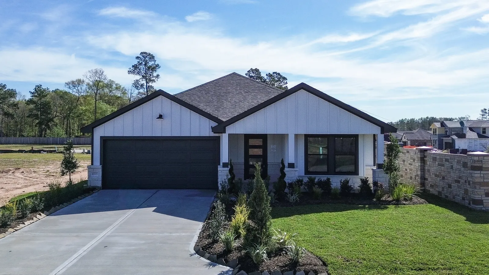Front exterior of 10727 Crockett Meadows, a new home by Alta Homes, Conroe, TX