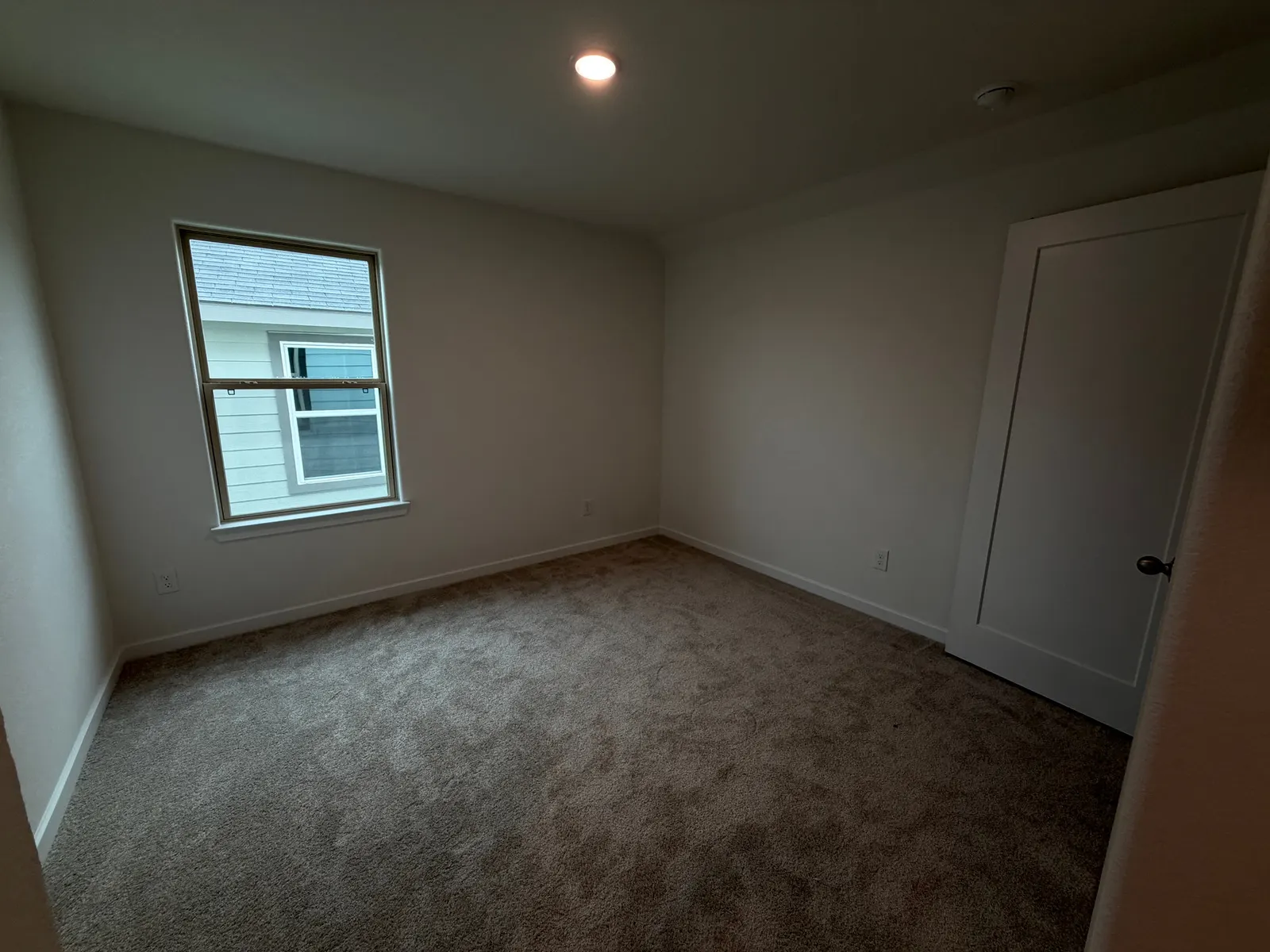 Carpeted bedroom at 11830 Serena's Song Drive, Willis, TX