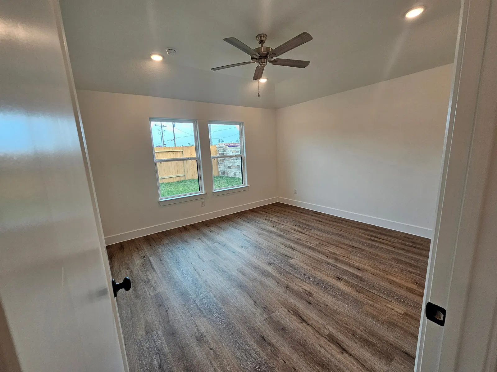 Bedroom with ceiling fan at 10727 Crockett Meadows, Conroe, TX