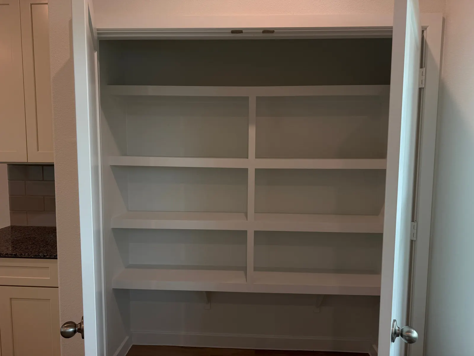 Pantry with shelving at 11830 Serena's Song Drive, Willis, TX
