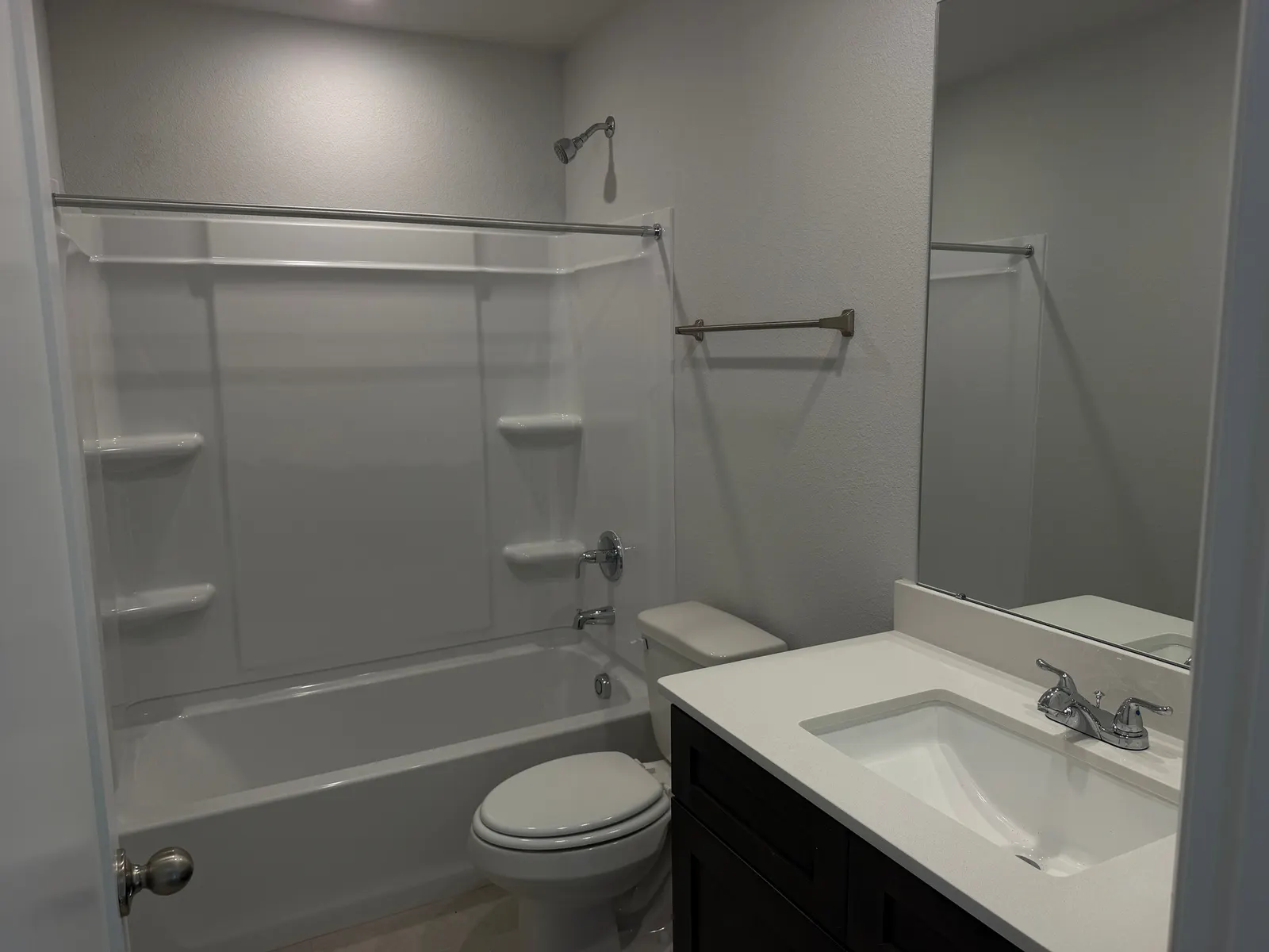 Bathroom with tub and shower at 11858 Serena's Song Drive, Willis, TX