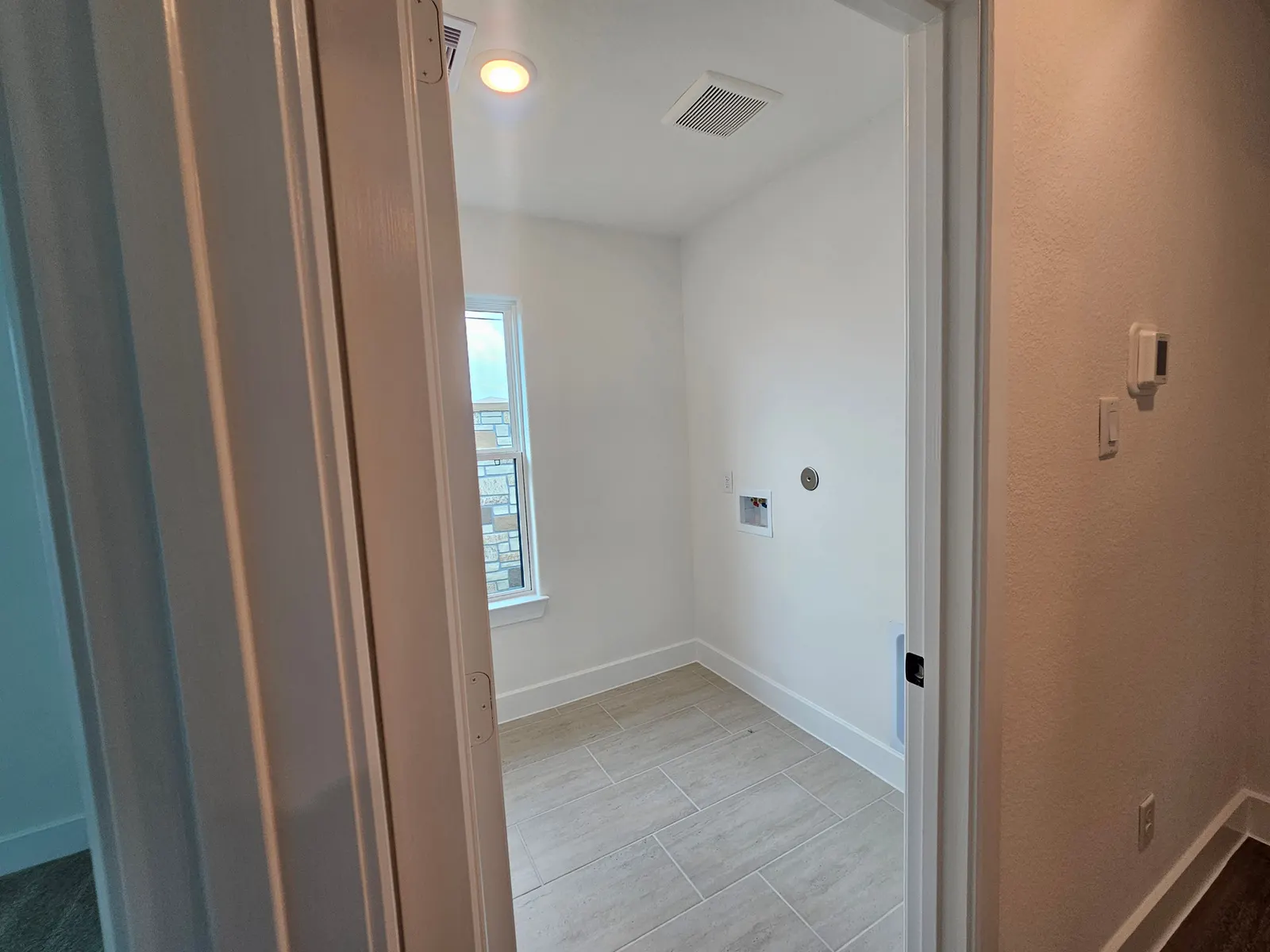 Hallway linen closet at 10727 Crockett Meadows, Conroe, TX