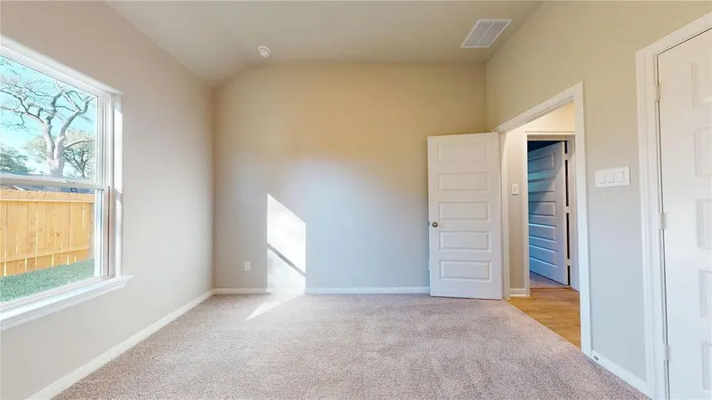 Carpeted bedroom with closet at 16701 Eastchase Street, Montgomery, TX