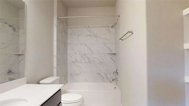 Bathroom with tub and shower at 16701 Eastchase Street, Montgomery, TX