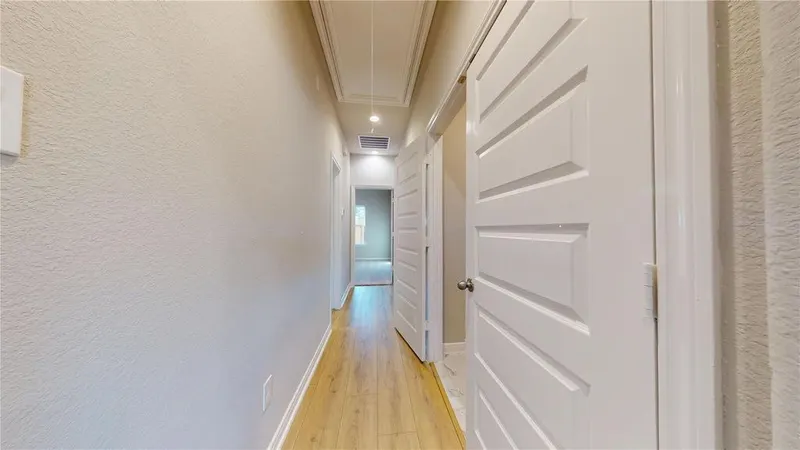 Hallway toward the bedrooms at 16701 Eastchase Street, Montgomery, TX