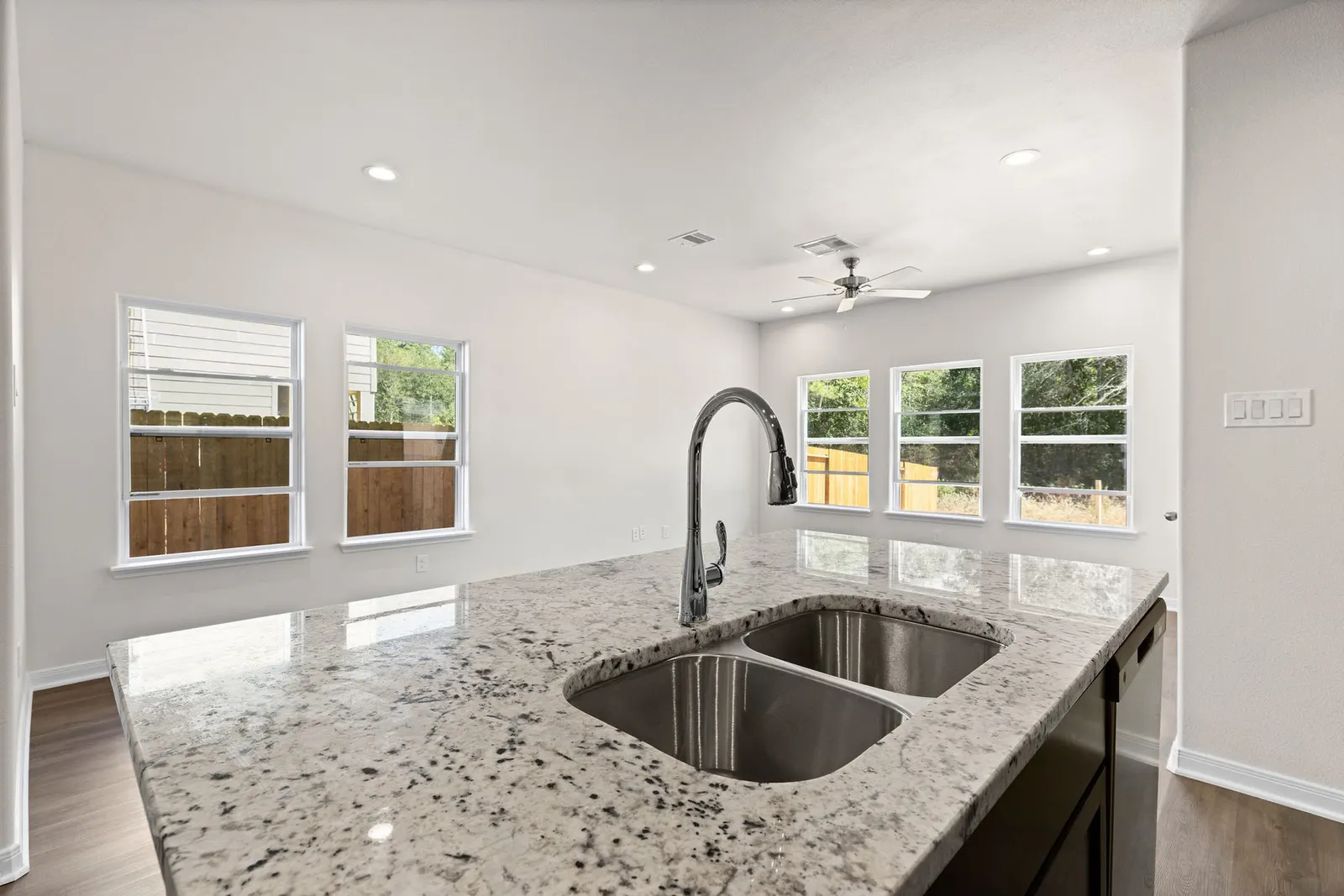 Kitchen sink with granite counters at Lake Conroe Village, Montgomery, TX