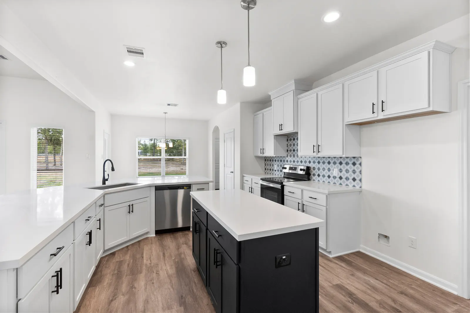 white kitchen with two tone island in Conroe Texas