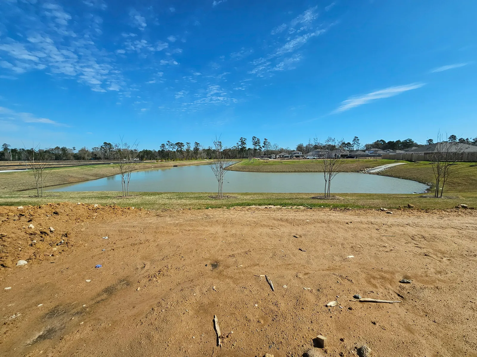 Homesite with community pond at 10715 Crockett Meadows, Conroe, TX
