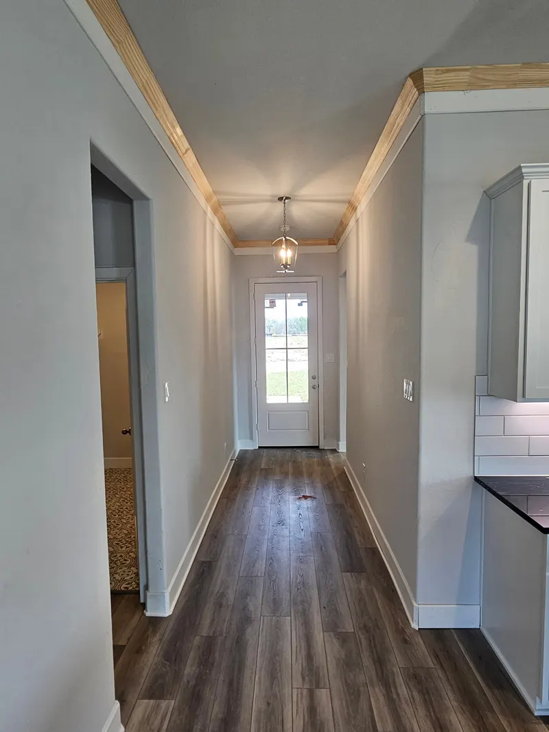 Hallway looking toward the front door at 11803 Serena's Song Drive, Willis, TX