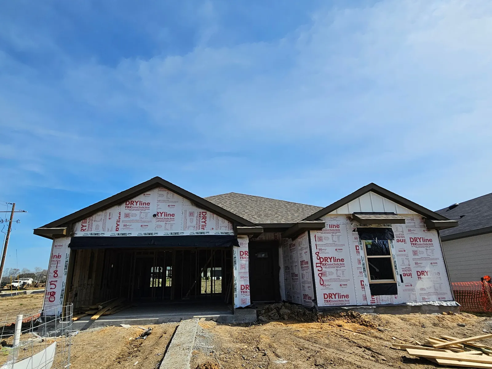 Front exterior during framing at 11858 Serena's Song Drive, Willis, TX
