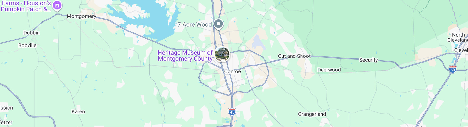 Map showing the Montgomery County Texas area including Conroe, Montgomery, Willis, and Splendora, with Lake Conroe to the north, I-45 running through the center, and nearby landmarks including The Woodlands, WG Jones State Forest, and Heritage Museum of Montgomery County.